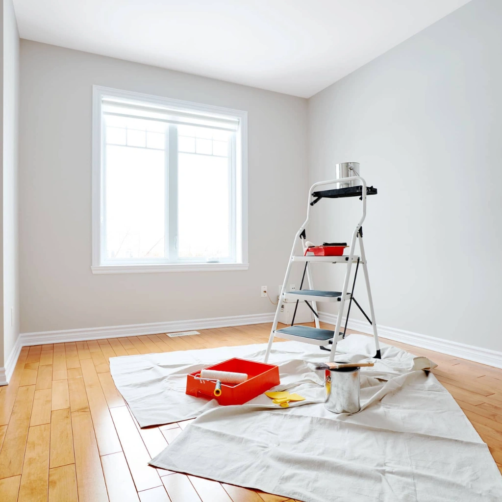 Professional painting setup with ladder and equipment in Adelaide Hills home