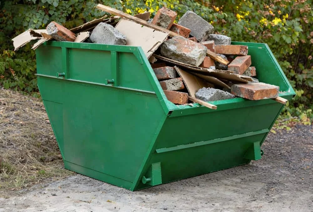 Skip bin filled with construction waste in Adelaide Hills